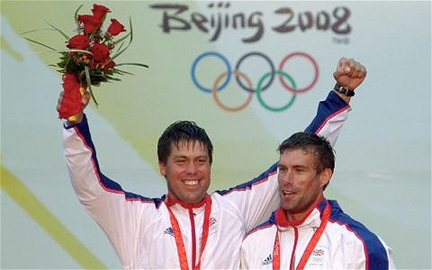 Andrew Simpson celebrating Olympic gold medal with companion Iain Percy